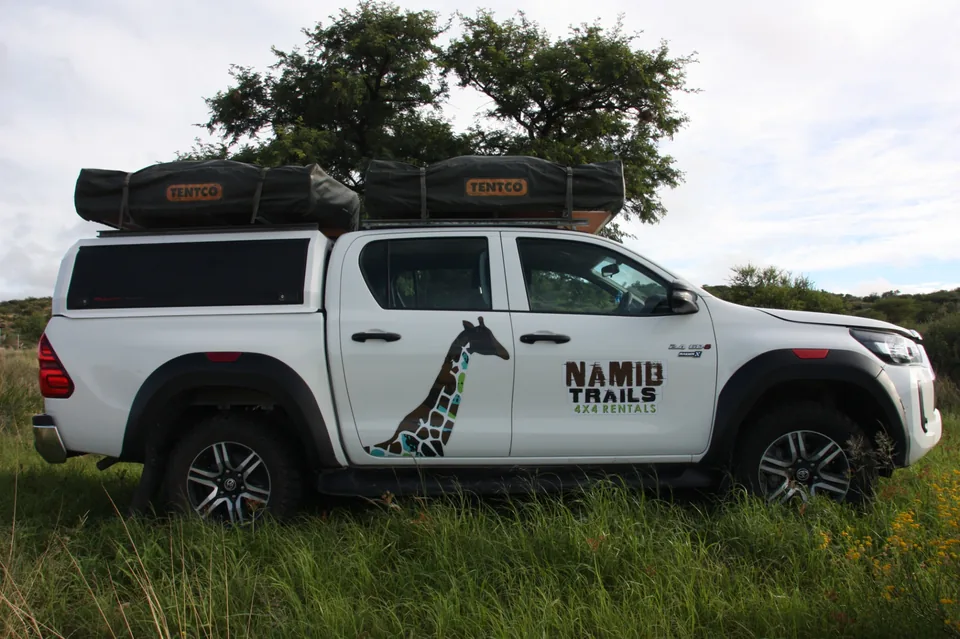Namib Trails 4x4 Toyota Hilux with rooftop tents in the Namibian bush